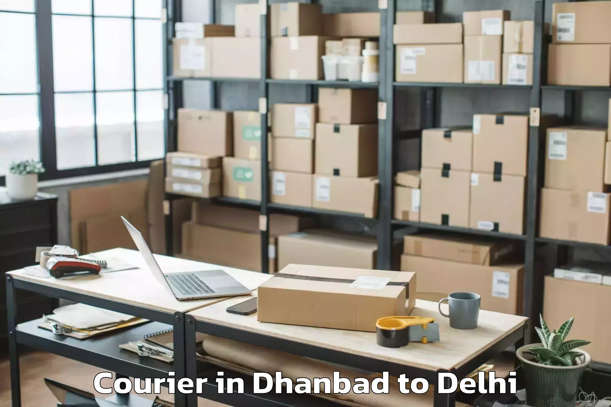 Trusted Dhanbad to Indira Gandhi International Ai Courier